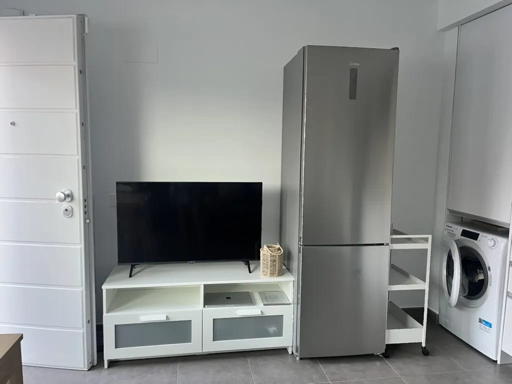 Apartment kitchen in a panoramic interior view